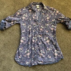 Floral button up with lace edges.